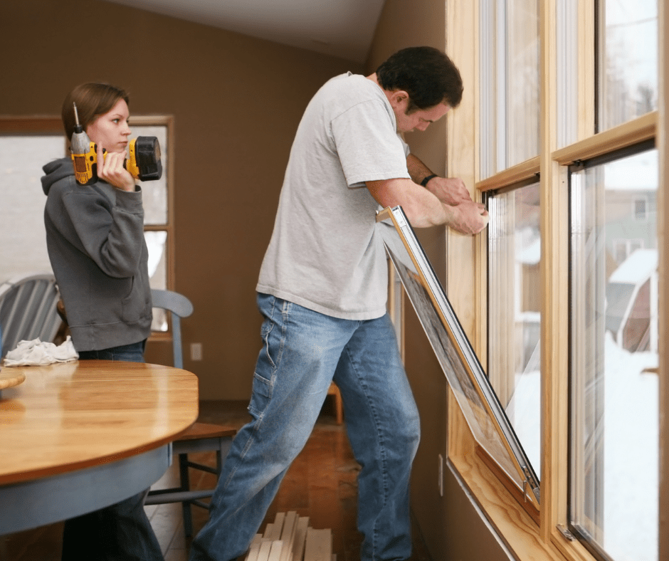 people installing energy efficient windows