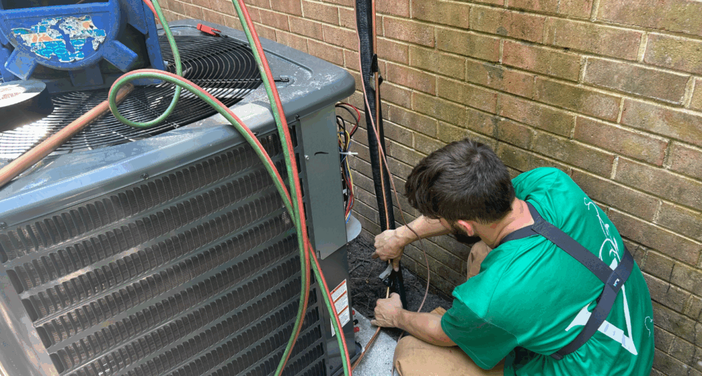Ecsi HVAC contractor working on an ERV