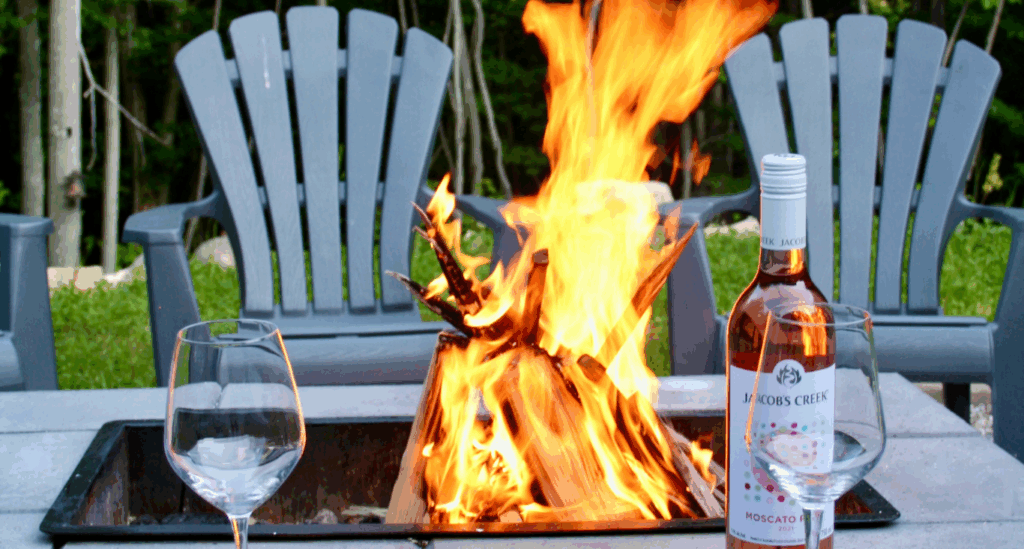 Multi-Functional Fire Pit being used as a Table and a Source of Cooking.