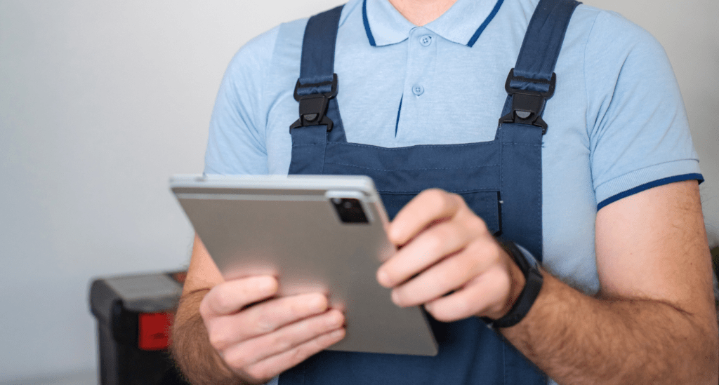 Building Manager Controlling Building Temperature with a Tablet.